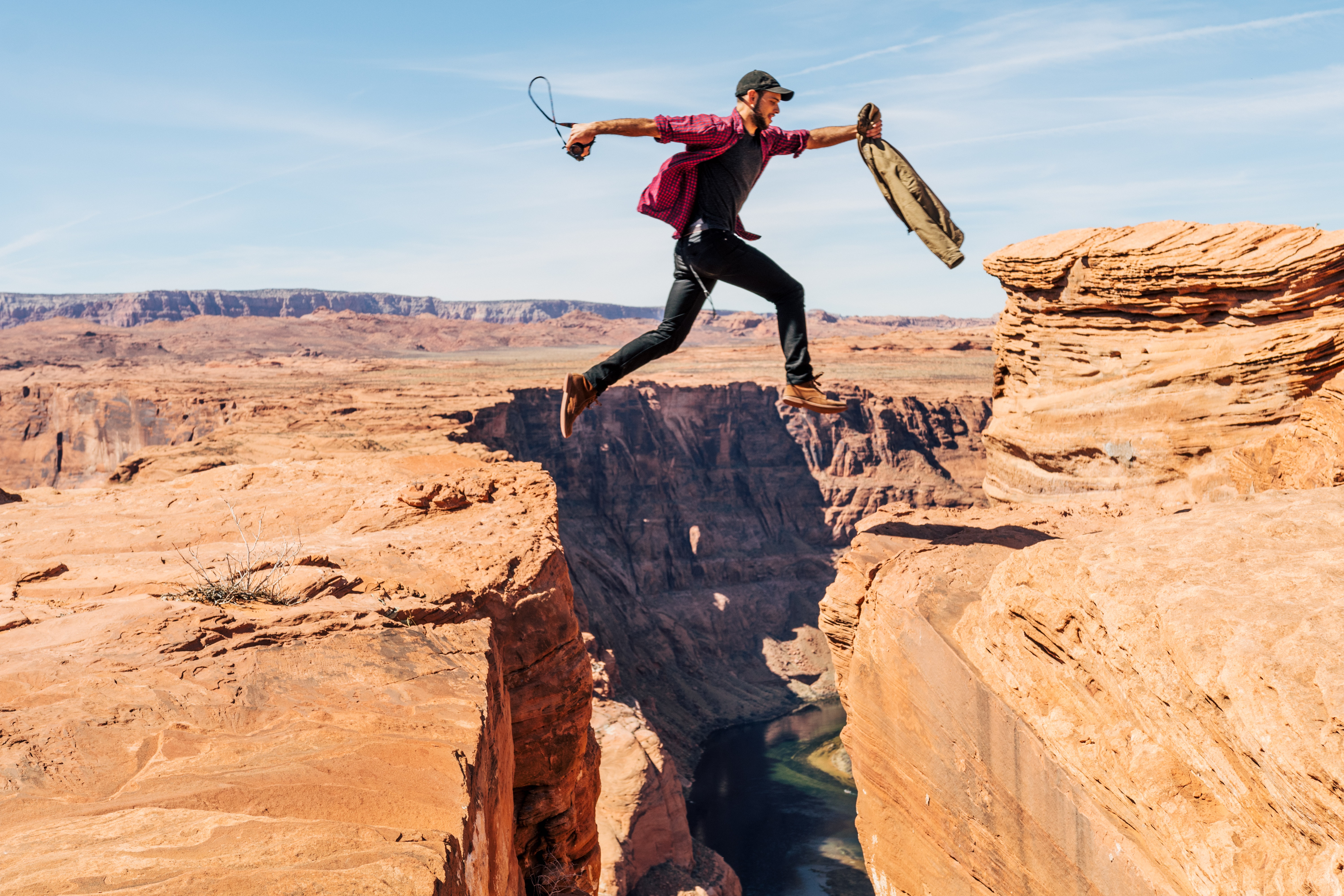 This is a photo of a man jumping across a chasm or small canyon. In jumping across, this man shows that he has the faith that he will make it across; otherwise, he would have never attempted it. Thus, his faith was based, at least partly, on reason: he knew that his physical strength and his ability to jump would likely enable him to successfully complete the jump. 